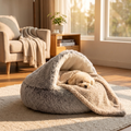 The perfect combo: pup asleep in the Calming Nest with the Calming Blanket tucked over like a duvet